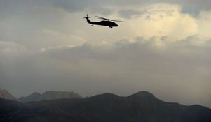https://upload.wikimedia.org/wikipedia/commons/f/f9/A_U.S._Army_UH-60_Black_Hawk_helicopter_carrying_U.S._Deputy_Secretary_of_Defense_Ash_B._Carter_flies_over_a_mountain_range_in_Afghanistan_May_13,_2013_130513-D-NI589-1770.jpg